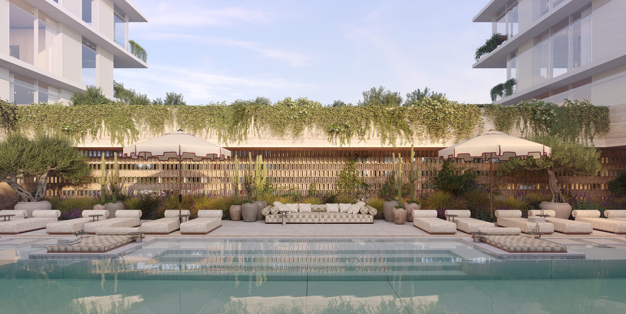 A rendering of the pool terrace with sun loungers and a green living wall