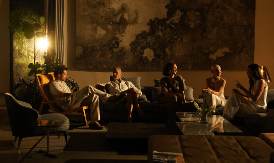 Residents gathered in a lounge in the evening